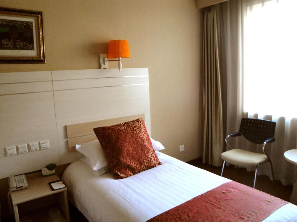 Overseas Chinese International Hotel Qingdao Bilik gambar