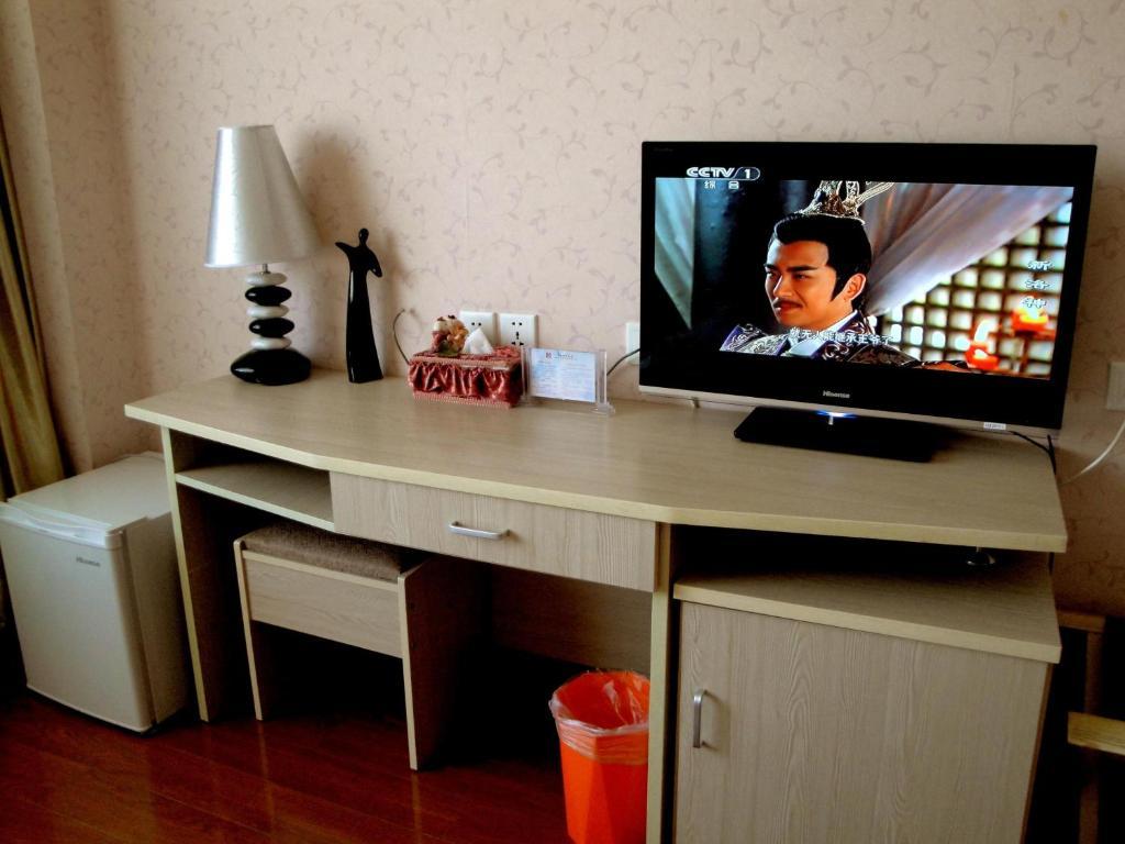 Overseas Chinese International Hotel Qingdao Bilik gambar